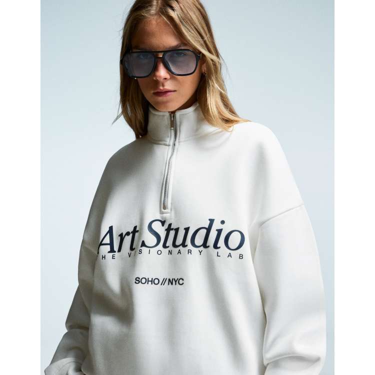 Bershka Printed quarter-zip sweatshirt in white | ASOS
