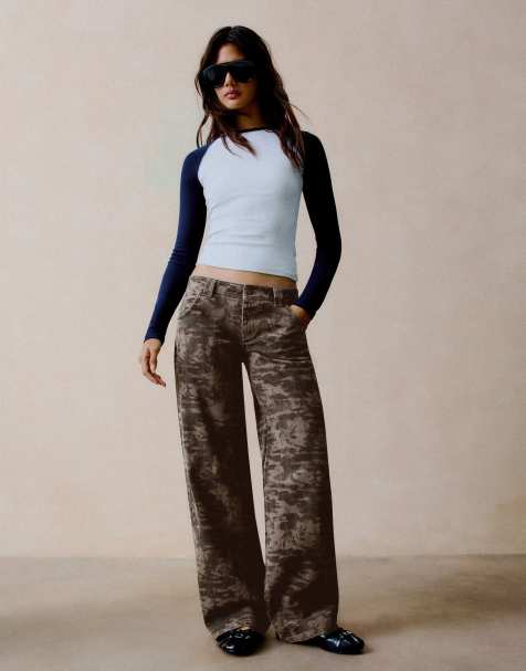Bershka Printed trousers with embroidered pocket and studs in brown - view 1