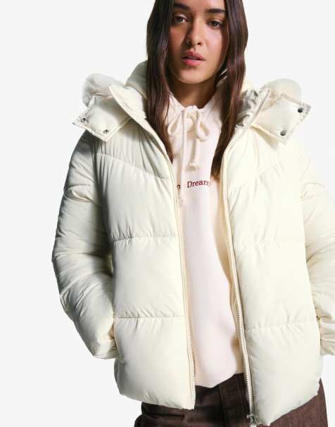 Bershka Puffer jacket with faux fur hood in beige