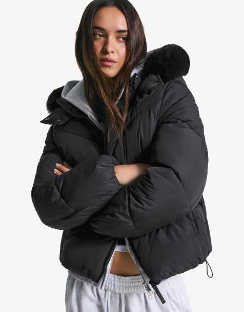 Bershka Puffer jacket with faux fur hood in black - view 1