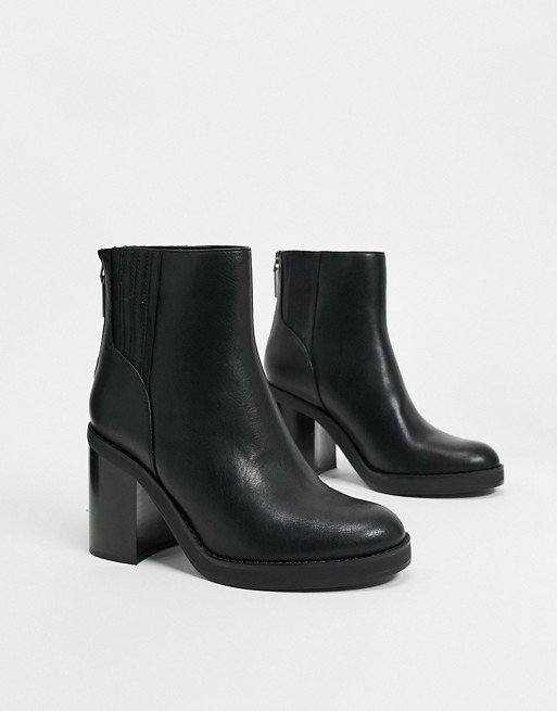 Bershka pull on chunky heeled boots in black | ASOS