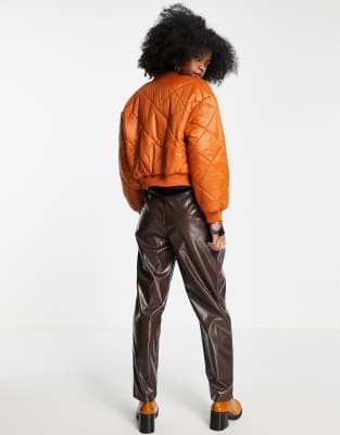 orange quilted bomber jacket