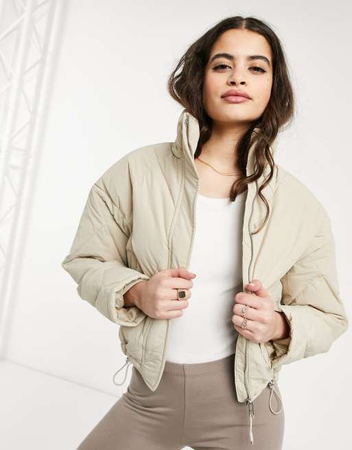 Bershka quilted padded puffer jacket in beige | ASOS