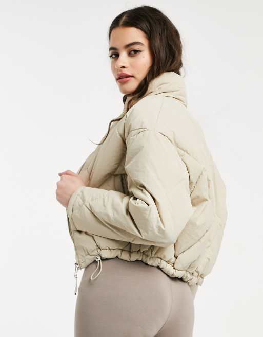 Bershka quilted padded puffer jacket in beige