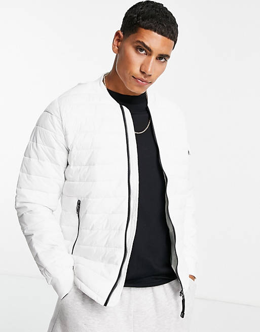 Bershka quilted puffer in white | ASOS