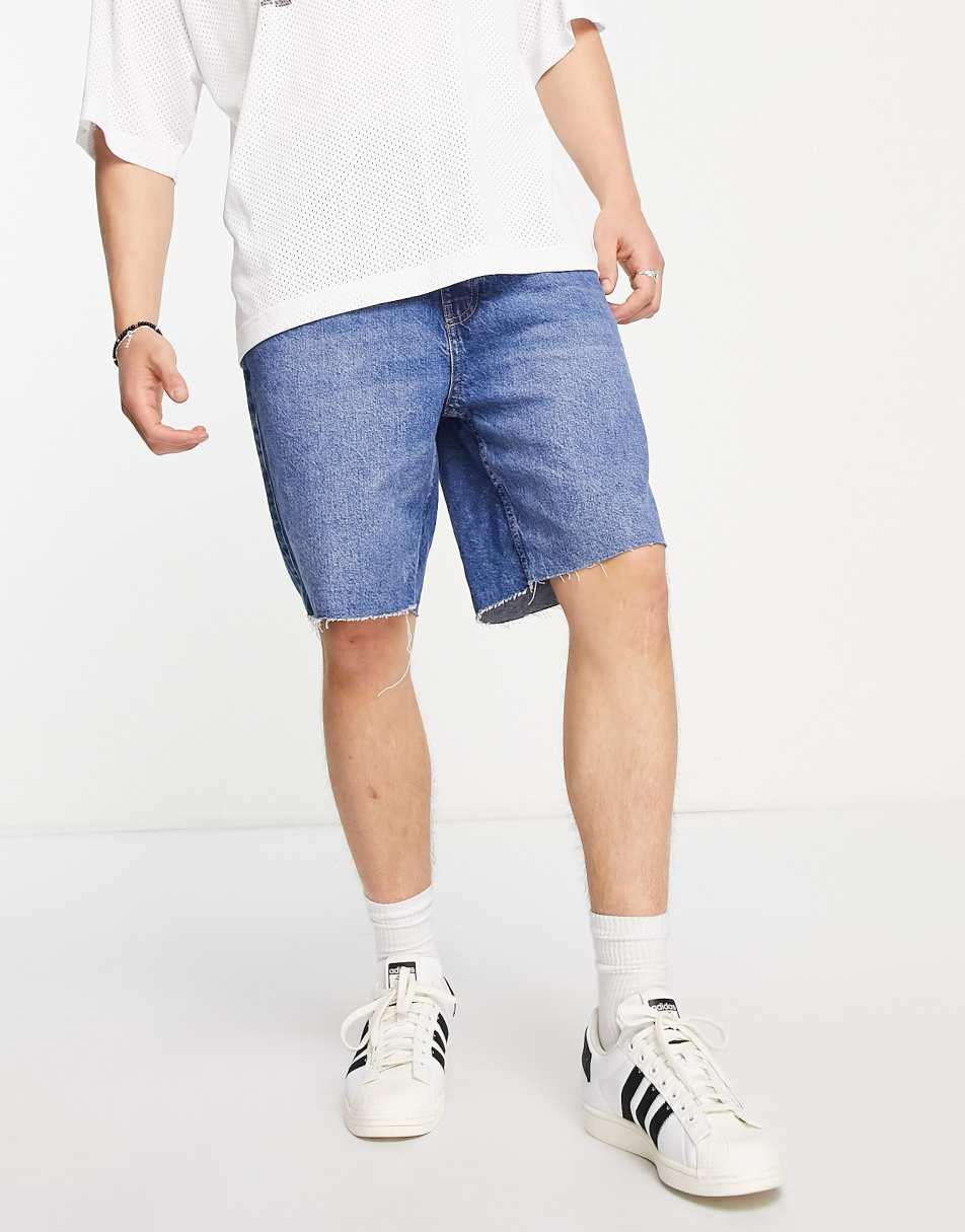 Bershka raw hem denim shorts in blue