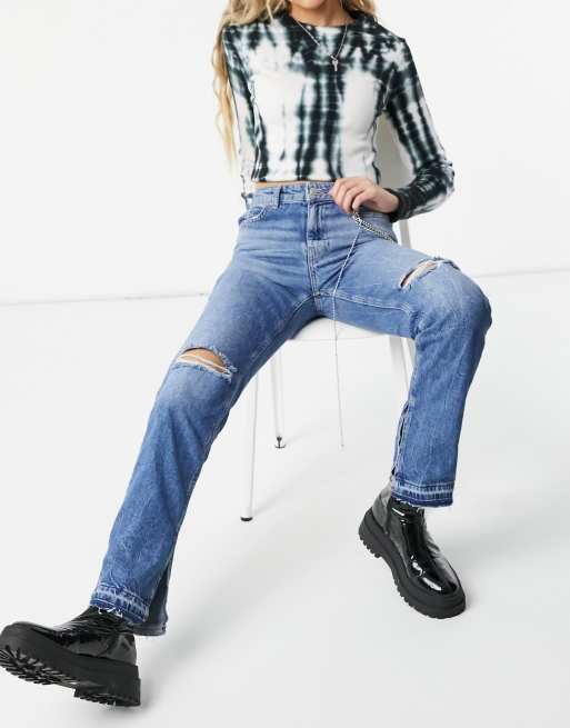 Bershka - Rechte jeans met kniescheuren en splitjes aan zijkanten in blauw