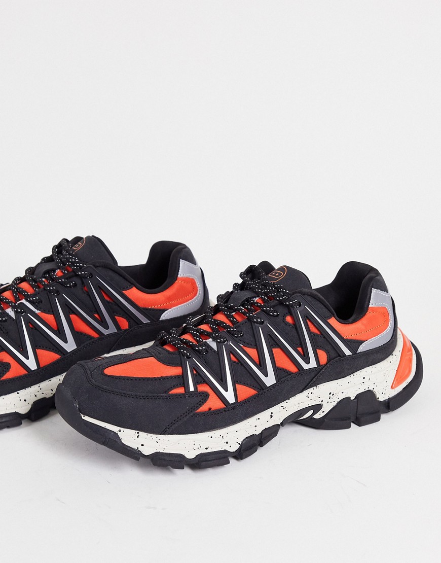 Bershka reflective chunky runner sneakers in black and orange-Multi