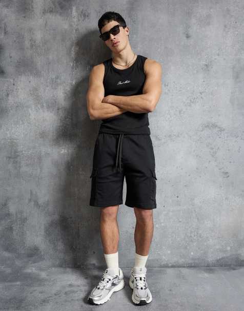Bershka Regular cargo bermuda shorts in black - view 1
