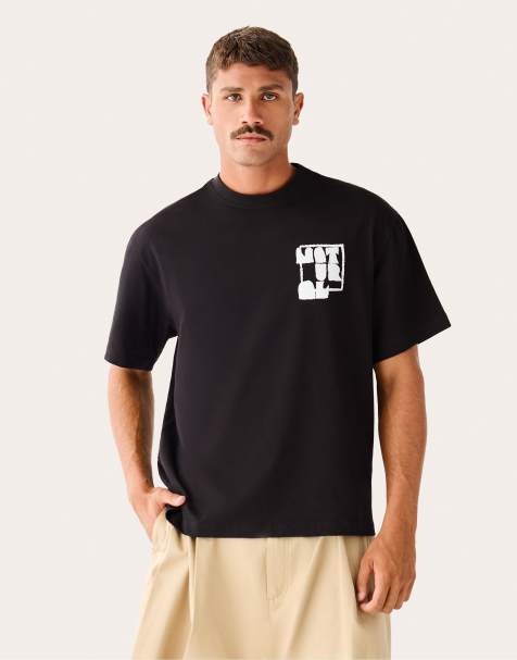 Bershka Relaxed fit t-shirt with floral print in natural in black