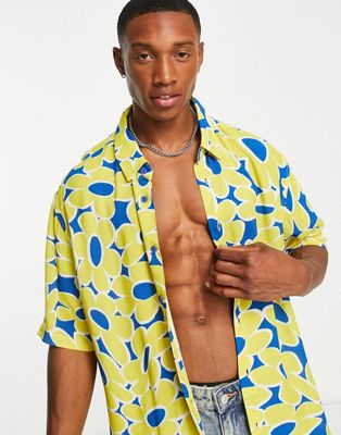 Bershka relaxed shirt in yellow floral print