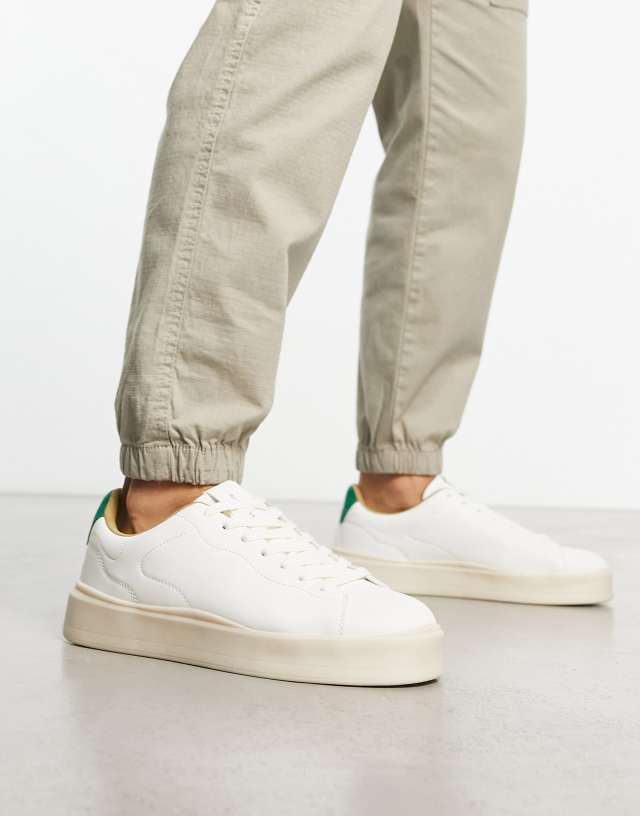 Bershka retro green back tab sneakers in white