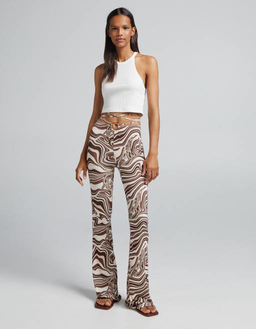 Bershka retro swirl print flares in brown