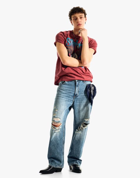 Bershka Ripped baggy jeans in denim blue