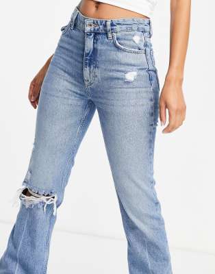 flare jeans with rips