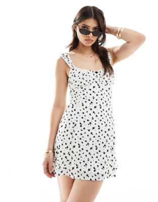 Bershka - Robe courte tendance folk avec détail nœud - Écru à fleurs - view 1
