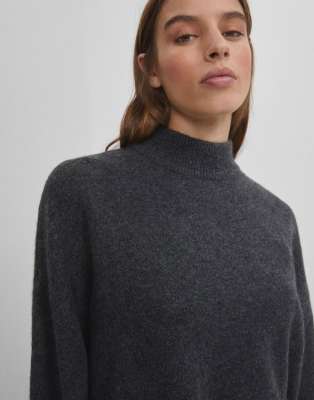dark grey roll neck jumper
