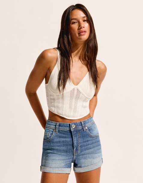 Bershka roll up denim shorts in mid blue