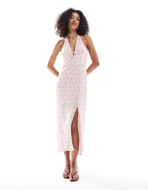 Bershka – Różowa sukienka maxi z dekoltem typu halter w kwiatowy wzór