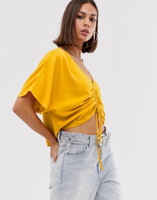 Bershka ruched front blouse in mustard | ASOS