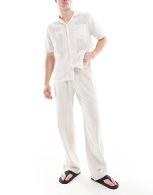 Bershka linen-rich striped pants in sand