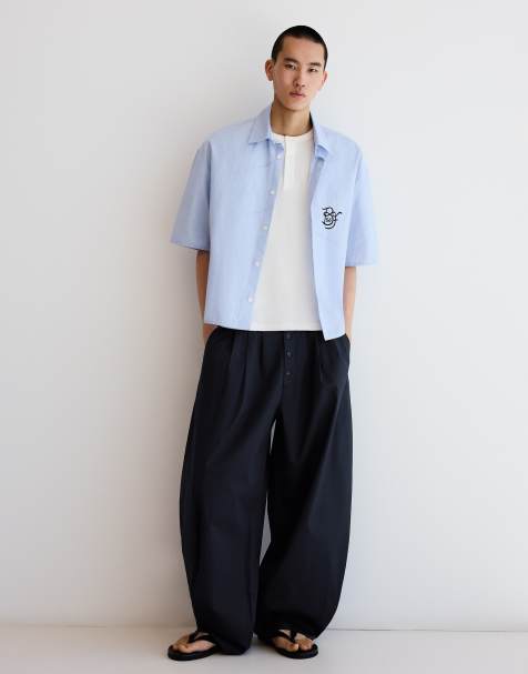 Bershka – Schmal geschnittene Barrel-Leg-Hose in Blau - view 1
