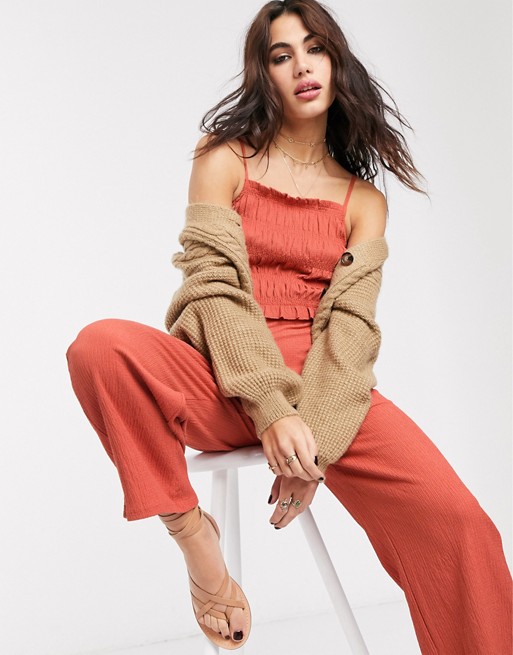 Bershka shirred strappy jumpsuit with ruched front in orange