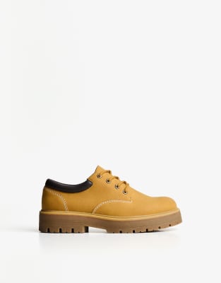  Shoes with quilted detail in yellow