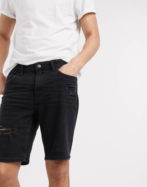 Short noir en jean avec détail déchiré