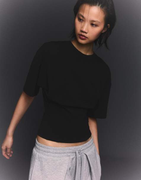 Bershka Short sleeve corset waist t-shirt in black - view 1