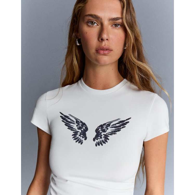 Bershka Short sleeve t-shirt with studded print in white ASOS