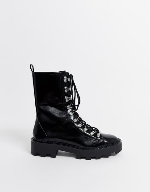 Bershka ski hook cleated sole boots in black ASOS