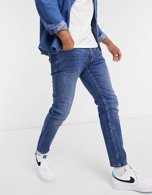 Bershka skinny fit jeans in mid blue