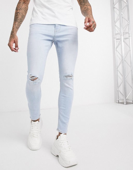 Bershka skinny jean with knee rips in light wash blue