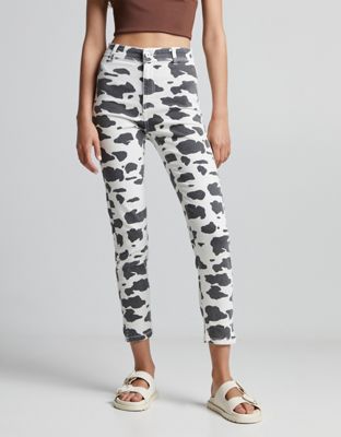 Bershka skinny jeans in cow print