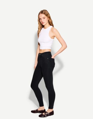 Bershka - Skinny-Jeans in Schwarz mit superhohem Bund