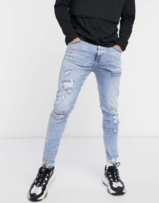 ripped paint splatter skinny jeans