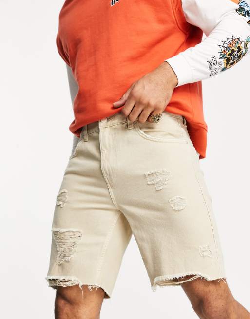 Bershka slim distressed denim shorts in ecru