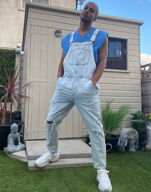 Bershka slim fit dungarees with rips in blue
