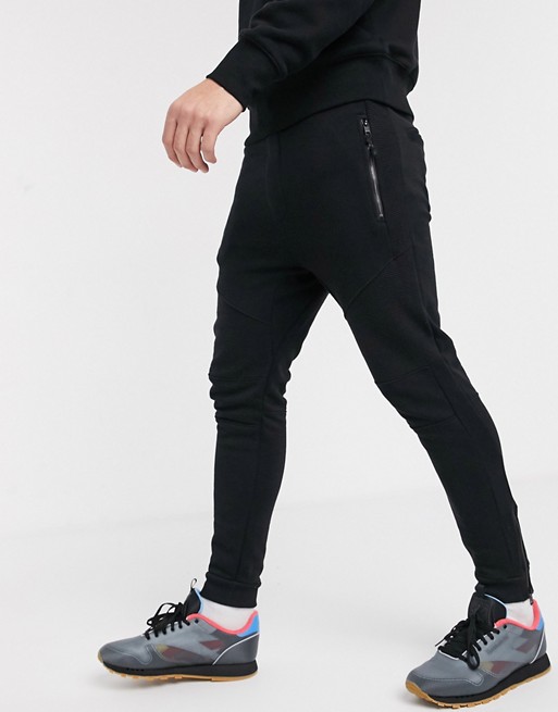 Bershka slim fit jogger with ribbed detail in black