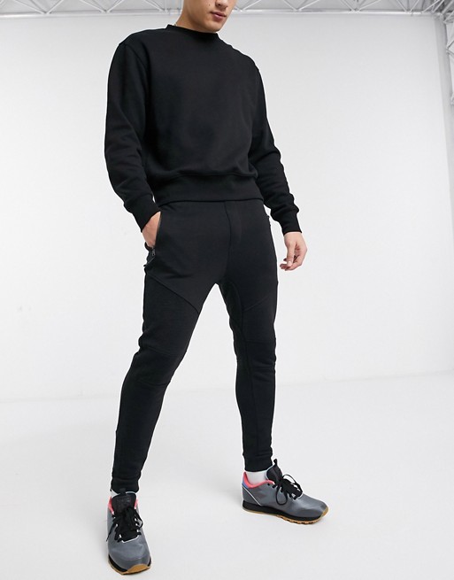 Bershka slim fit jogger with ribbed detail in black