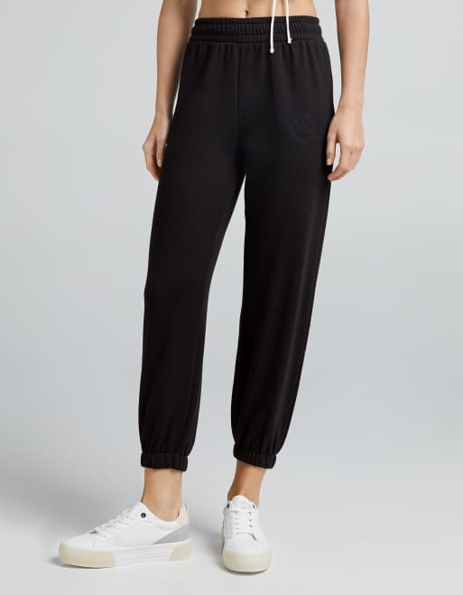 Bershka slim leg joggers in black ASOS