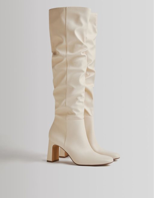 Bershka slouchy high leg boot in ecru