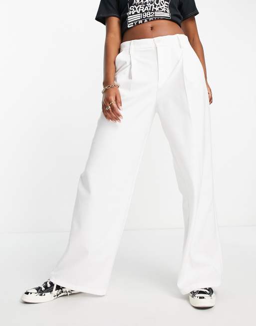 Bershka slouchy low waist tailored trousers in white | ASOS