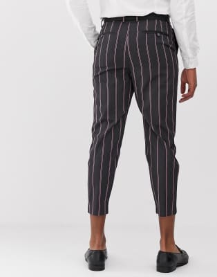 Bershka - Smaltoelopende broek in zwart met roze strepen | ASOS