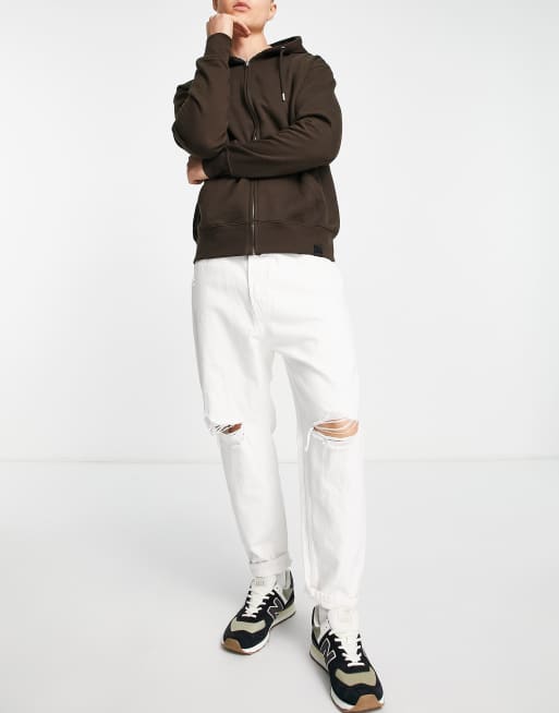 Bershka - Smaltoelopende jeans met scheuren in lichtblauw