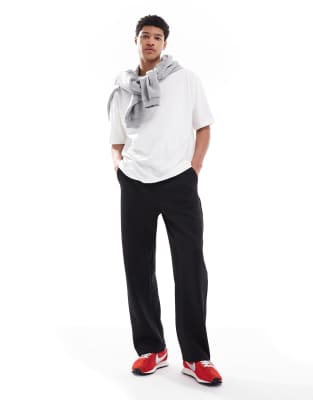 Bershka side panel track pants in black