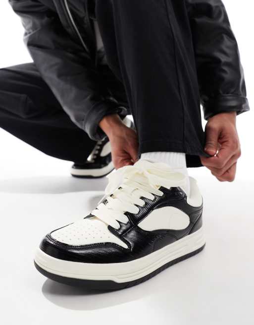 Bershka - Sneakers met dikke zool en contrasterende inzetstukken in zwart