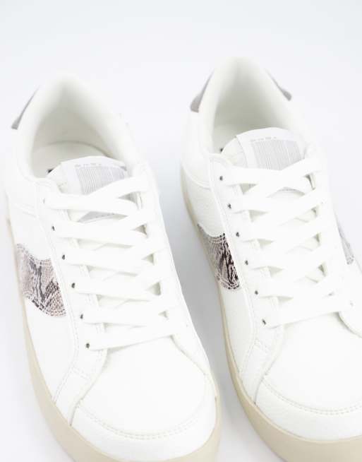 Bershka sneakers with snake print tab in white | ASOS