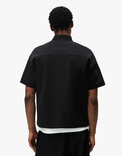 Bershka - Sort oversized polo med korte ærmer i firkantet pasform